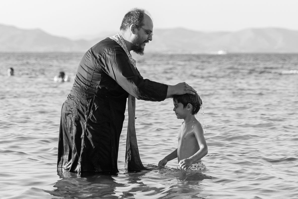 Baptism at the sea of Agioi Anargyroi Aegina